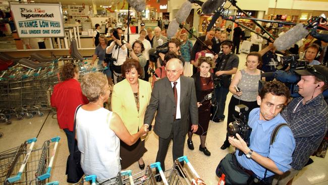 October 11, 2001: Prime Minister John Howard took to the streets today stopping in at Pick'n’Pay Hypermarket in Aspley. Picture: AAP/Dave Hunt