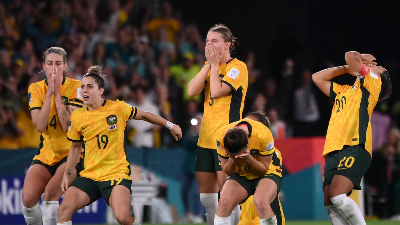 Kerr (right) was all of Australia during the shootout. (Photo by FRANCK FIFE / AFP)