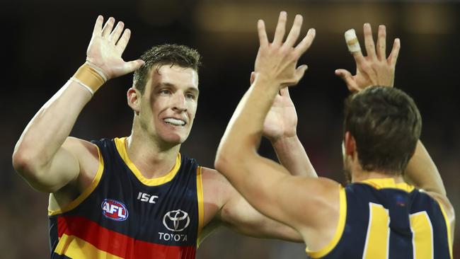 Josh Jenkins celebrates one of his five goals on Friday night with teammate Paul Seedsman. Picture SARAH REED