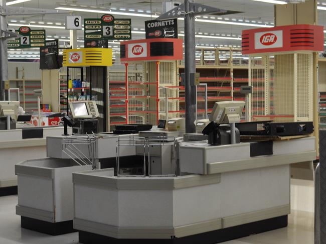 Empty shelves after the closure of Cornett’s IGA supermarket in Innisfail.