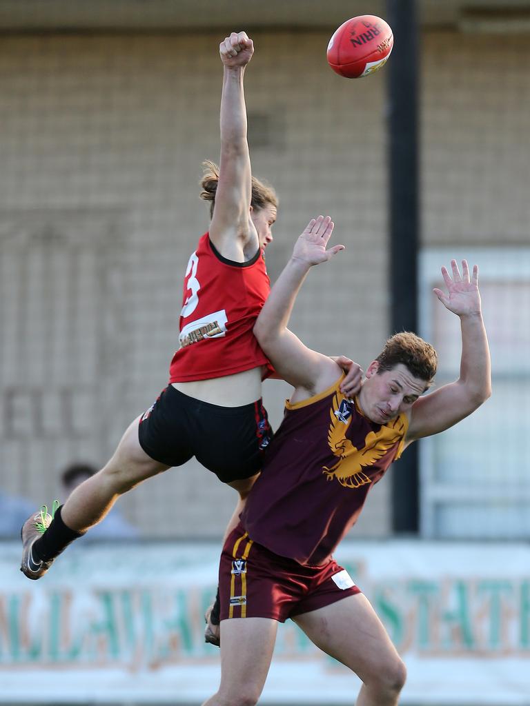 Wimmera Football League round 7 match between Stawell Warriors and Warrack Eagles. Stawell 13. 8 (84) defeated Warracknabeal 11. 13 (79). Jakob Salmi jumps high to deflect a mark away from Jack Wilson. Picture: Yuri Kouzmin