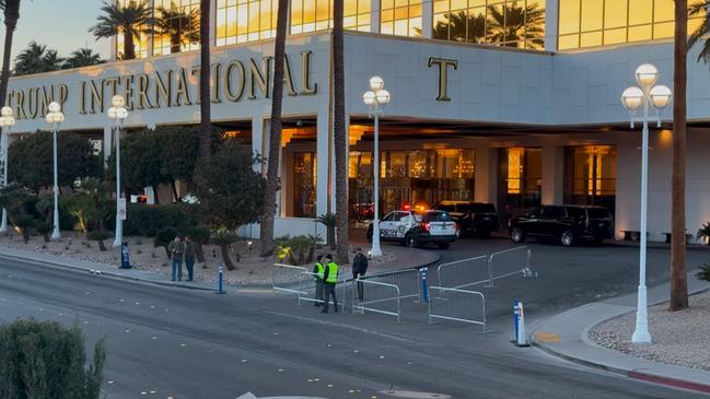 Police continue to be stationed at The Trump Hotel in Las Vegas.