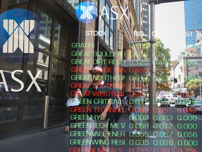 ????SYDNEY, AUSTRALIA : NewsWire Photos - FEBRUARY 24 2025; A general view of people walking past the digital boards of the ASX in the Sydney CBD. Picture: NewsWire/ Gaye Gerard