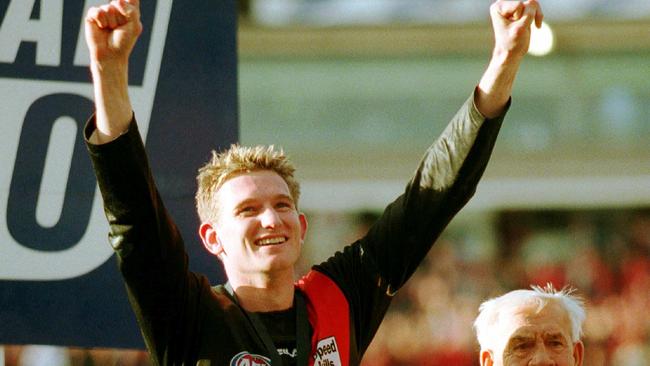 James Hird salutes fans after leading Essendon to the 2000 premiership.