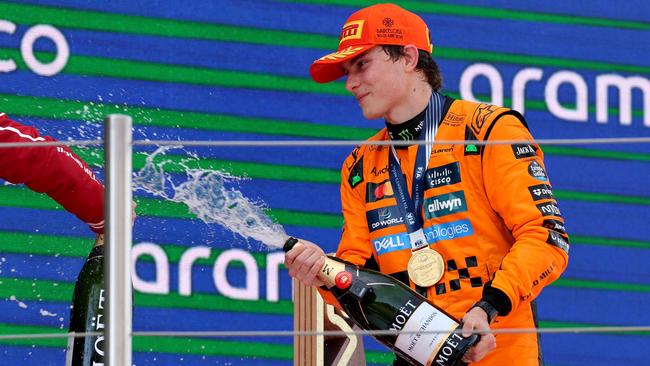 McLaren's Australian driver Oscar Piastri celebrates on the podium after winning the Formula One Spanish Grand Prix. Picture: AFP