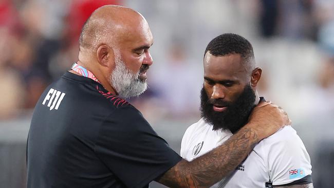 Semi Radradra is consoled by Simon Raiwalui after their loss to Wales. (Photo by Alex Livesey/Getty Images)