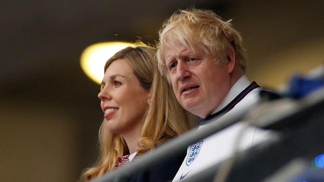 Britain's PM Boris Johnson and wife Carrie take their seats ahead of the UEFA EURO 2020 final football match between Italy and England at the Wembley Stadium. Picture: AFP