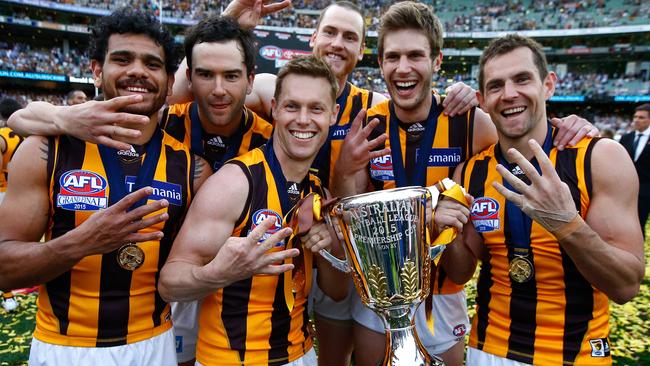 Sam Mitchell celebrating his fourth premiership with Hawthorn teammates in 2015. Picture: Wayne Ludbey