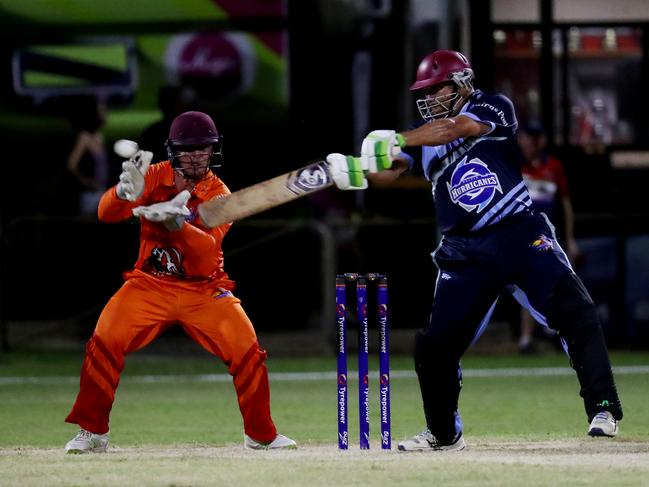 Barrier Reef Big Bash Game 1: Badgers v Hurricanes at Griffiths Park. Badgers, Angus Warnock and Hurricanes' Barry Weare. Picture: Stewart McLean