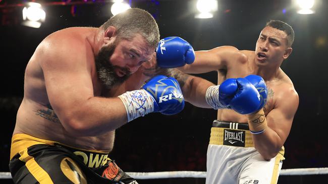 Sio Siua Taukeiaho (R) lands a punch on Jaiman Lowe last year. Picture: Mark Evans/Getty