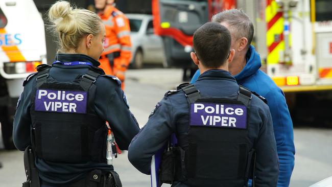 Police belonging to the Victoria Police VIPER Taskforce at the site of the shooting death of Mohammed Keshtiar in South Yarra. Picture: Luis Enrique Ascui