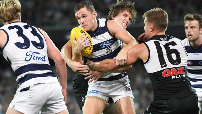 Joel Selwood of the Cats is seen in action during the win against Port Adelaide.