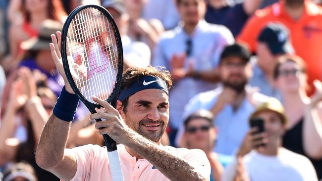 Roger Federer celebrates his 6-3 7-6 victory over Robin Haase.