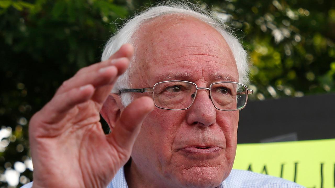 Democratic presidential hopeful Bernie Sanders looks into the facility holding migrant children in front of a detention centre in Homestead, Florida, on June 26, 2019. Picture: Rhona Wise/AFP.