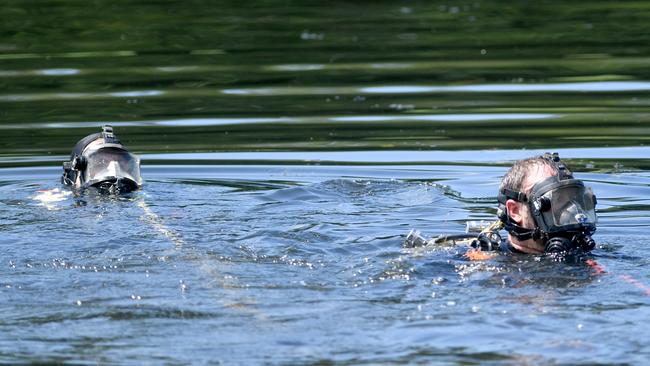 Police divers search Ross River at Riverway for missing person. Picture: Evan Morgan