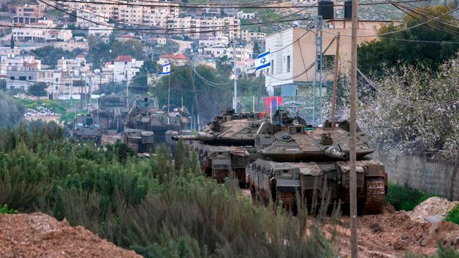 Israel said troops would stay in West Bank refugee camps for the coming year, announcing expanded military operations including tank deployments, after the displacement of tens of thousands of Palestinians.