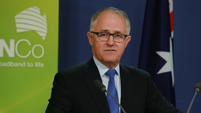 The Minister for Communications, Malcolm Turnbull MP and NBN Co Limited CEO Bill Morrow and Telstra CEO David Thodey hold a press conference at the Commonwealth Parliamentary Office in Sydney. Pic - Britta Campion