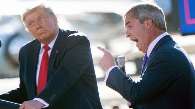 Donald Trump listens as Nigel Farage speaks during a Make America Great Again rally at Phoenix Goodyear Airport, Arizona, 2020.