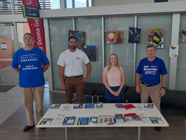 Division 1 candidates Alec Pokarier, Mark Hammel, Renee Clarke and Pat Reynolds standing 1.5m apart in solidarity. Picture: Paul Weston