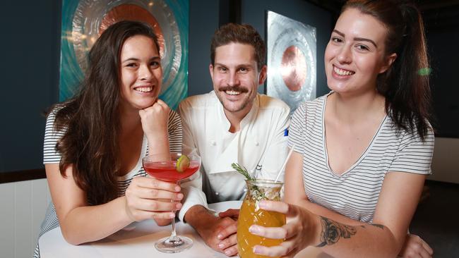 Wendy Bristow, 20, Ridgeway Group Executive Chef Dustin Sanderson and Alina Krauksts, 21, at Bin 931 in the new food precinct at Westfield Chermside's $355 million renovation.