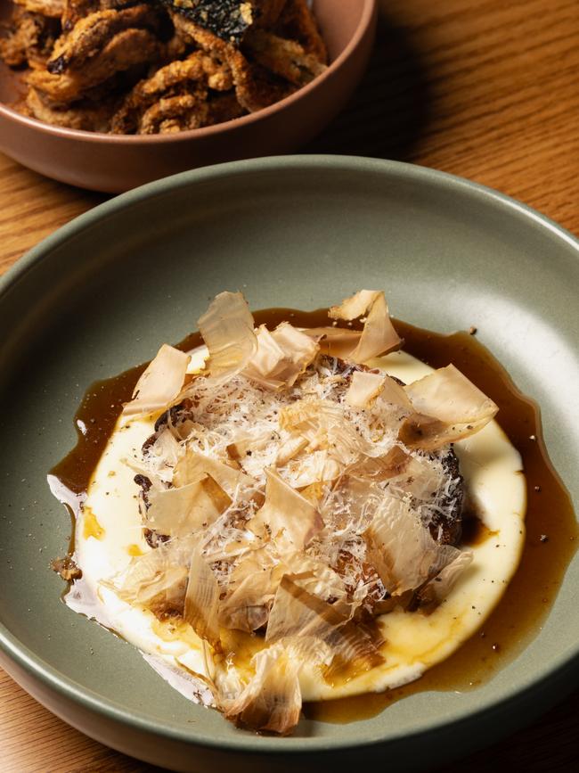 Risotto al salto with parmesan cream and bonito flakes at Latteria eatery was also a top starter offering in 2024. Pictures: Supplied.