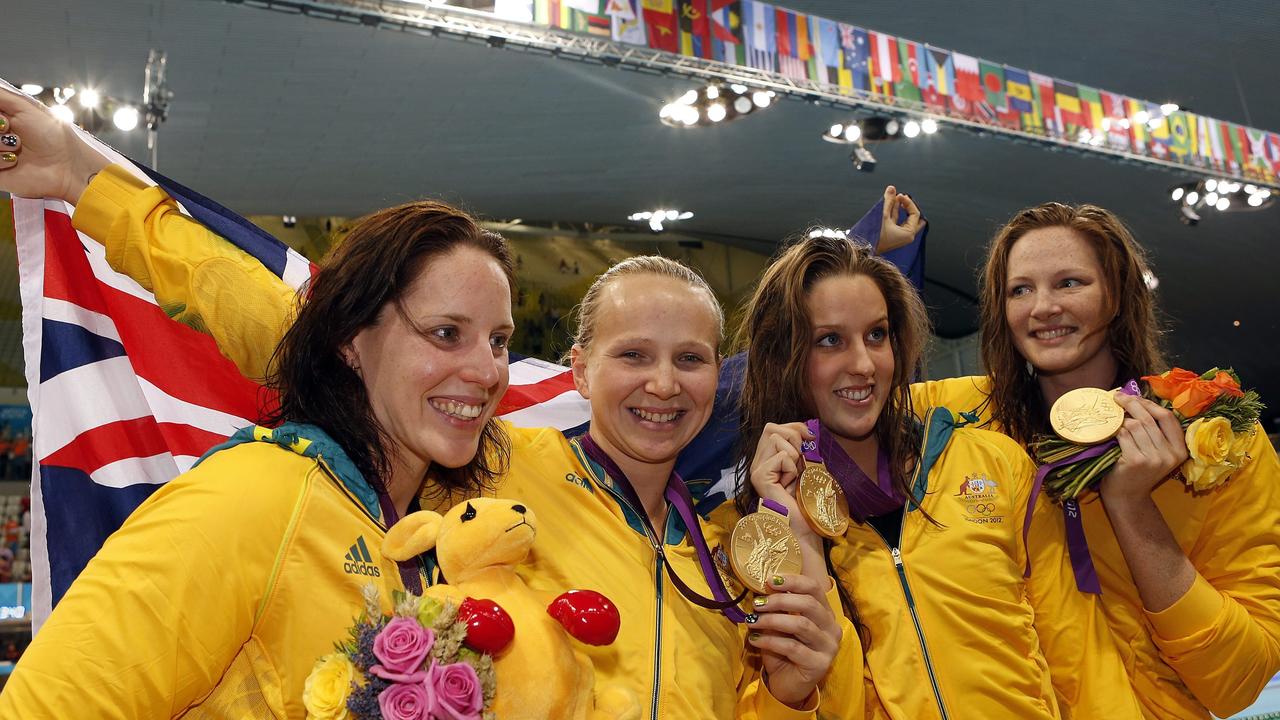 (L-R) Alicia Coutts, Melanie Schlanger, Brittany Elmslie and Cate Campbell of Australia pose with their gold medals after winning in the women's 4x100m Freestyle Relay Final during the Swimming competition held at the Aquatics Center during the London 2012 Olympic Games in London, England, 28 July 2012. EPA/PATRICK B. KRAEMER