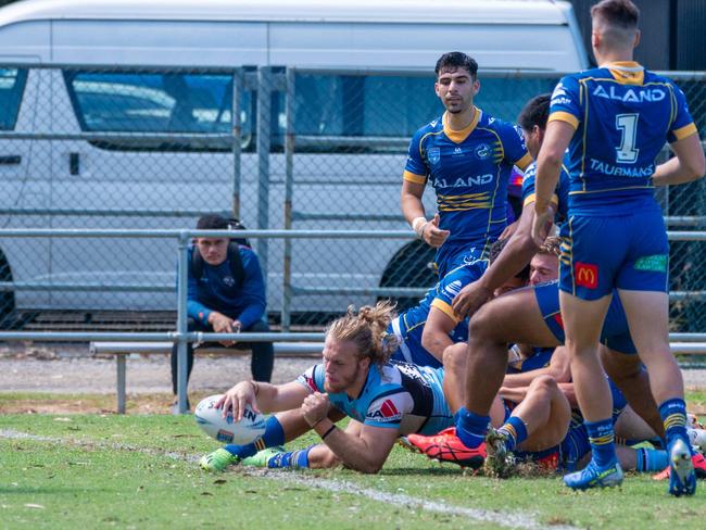 Samuel McCulloc scores for Cronulla in round six. Picture: Thomas Lisson