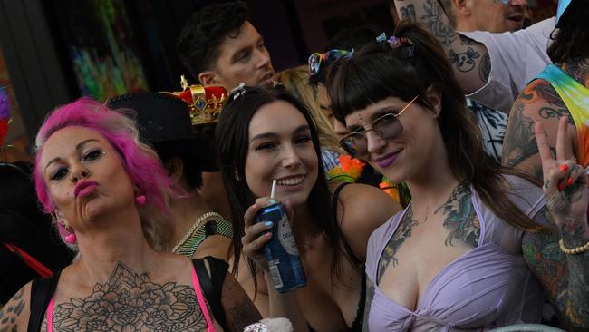 People gather on Oxford Street to watch the 45th Sydney Gay and Lesbian Mardi Gras. (Picture: Saeed Khan / AFP