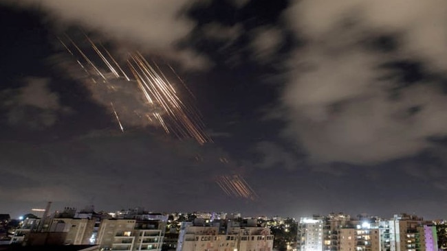 Israel’s Iron Dome antimissile system intercepts rockets after Iran fired a salvo of ballistic missiles on Oct. 1. Picture: Amir Cohen/Reuters