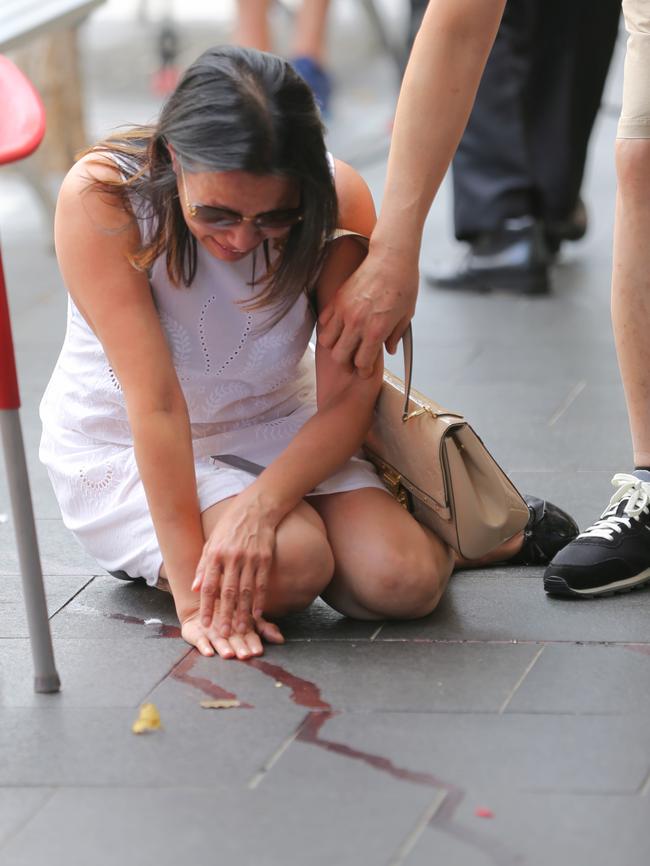 A distraught Vivian Vo at the crime scene. Picture: John Grainger