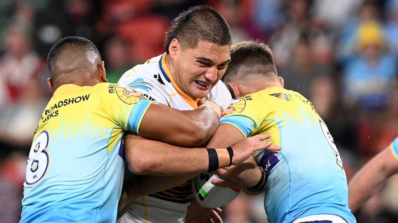 BRISBANE, AUSTRALIA - MAY 07: Wiremu Greig of the Eels takes on the defence during the round 10 NRL match between Gold Coast Titans and Parramatta Eels at Suncorp Stadium on May 07, 2023 in Brisbane, Australia. (Photo by Bradley Kanaris/Getty Images)