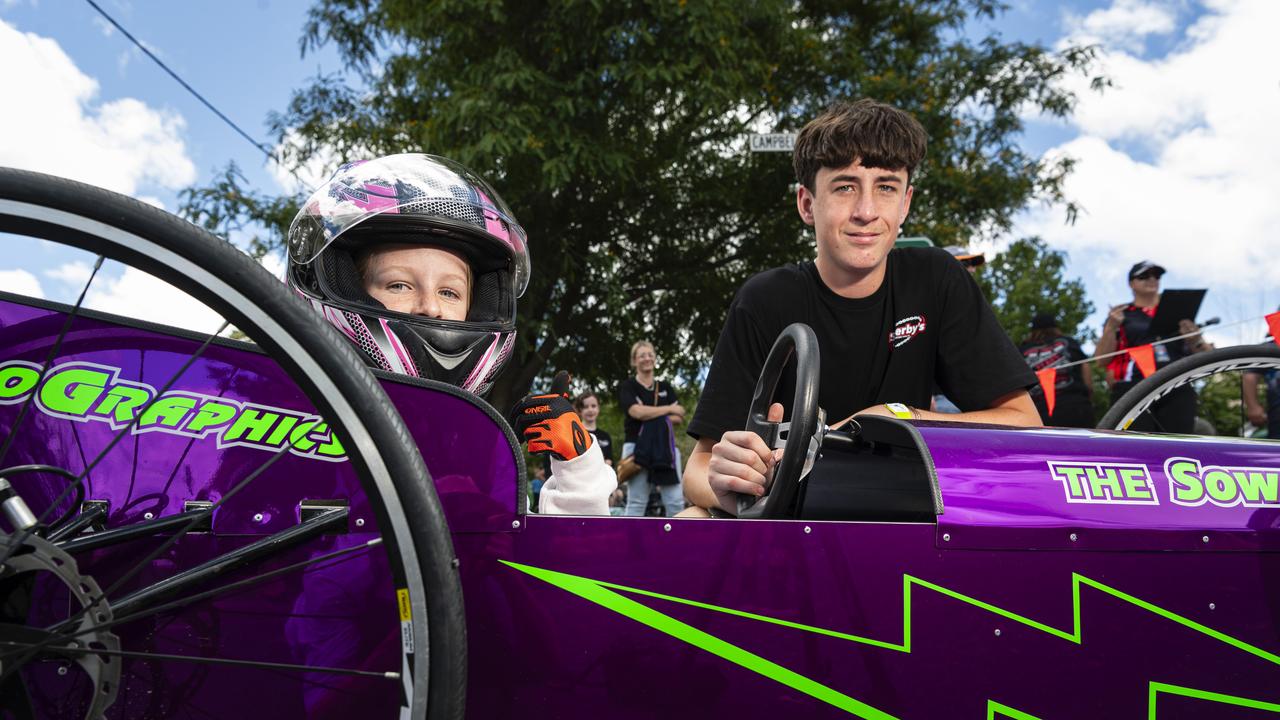 Addison Evans in the drivers seat assisted by Hunter Evans in the Greenmount Billy Kart Challenge, Saturday, November 23, 2024. Picture: Kevin Farmer