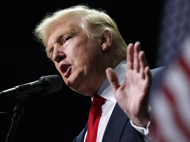 FILE - In this Nov. 4, 2016, file photo, Donald Trump speaks in Hershey, Pa. President-elect Trump holds stock in the company building the disputed Dakota Access oil pipeline, and pipeline opponents warn that Trumpâ€™s investments could undercut any decision he makes on the $3.8 billion project as president. (AP Photo/ Evan Vucci, File)