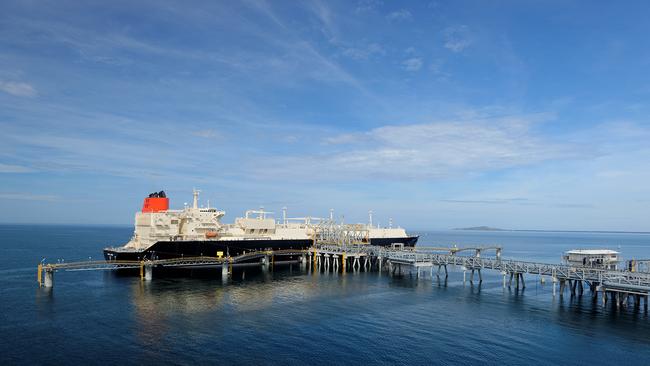 A ship loads liquefied natural gas from the PNG LNG project in Papua New Guinea.