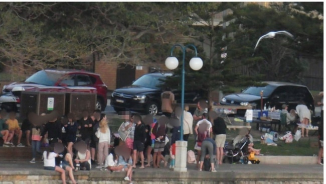 People drinking at East Esplanade on August 29, 2020, during COVID-19 when alcohol has been banned in the area. Picture: Supplied.