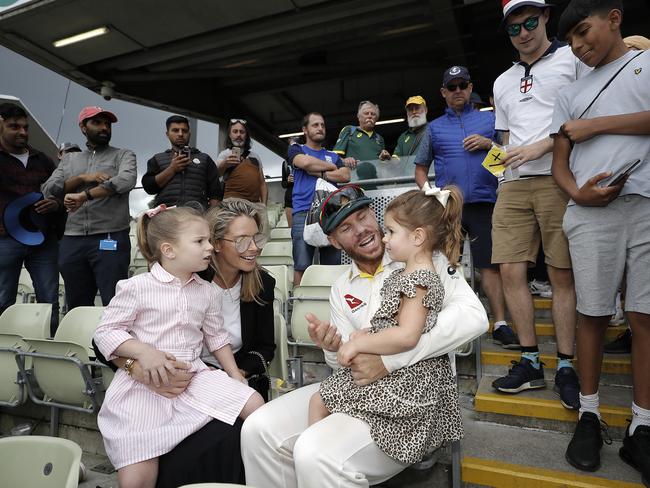 David Warner celebrates with his wife Candice Warner and daughters Indi and Ivy after day five of the First Ashes Test. Picture: Ryan Pierse/Getty Images