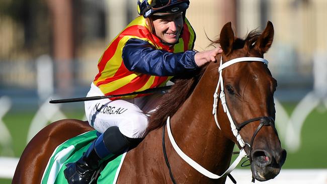 James McDonald was all smiles after Nature Strip’s dominant win in the TJ Smith Stakes. Picture: AAP