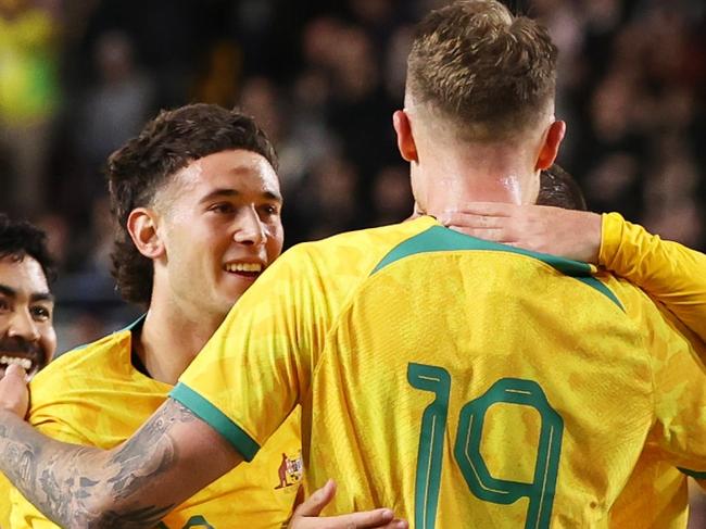 BRENTFORD, ENGLAND - OCTOBER 17: Harry Souttar of Australia celebrates with teammates after scoring the team's first goal during the Trans-Tasman Trophy international friendly match between Australia Subway Socceroos and New Zealand All Whites at Gtech Community Stadium on October 17, 2023 in Brentford, England. (Photo by Ryan Pierse/Getty Images)