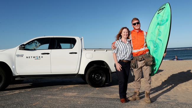 Christine Lowe with her son Tom at Toowoon Bay. (AAP Image/Sue Graham)