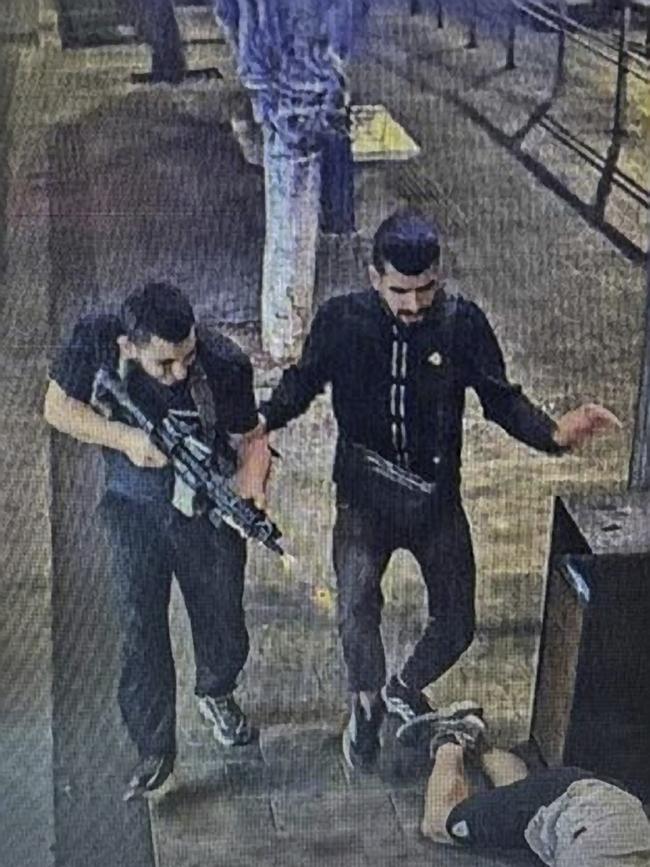 Two terrorists are seen leaving a light rail carriage in Tel Aviv. The pair shot and killed at least six Israelis in an attack in Jaffa, right before Iran launched a barrage of missiles into Israel.