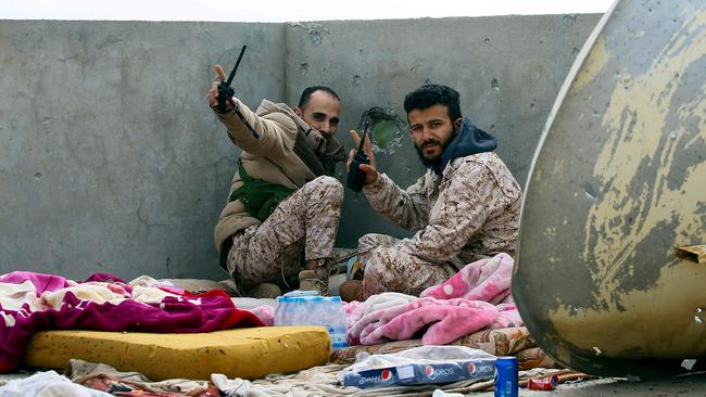 Fighters loyal to the GNA on a rooftop in Tripoli. Picture: AFP