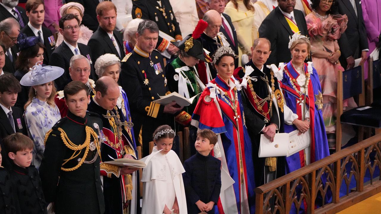 Prince Harry was relegated to the third row, two rows behind his brother, Prince William. Picture: Aaron Chown/WPA Pool/Getty Images