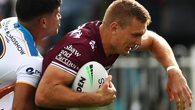 MUDGEE, AUSTRALIA - APRIL 17: Tom Trbojevic of the Sea Eagles is tackled during the round six NRL match between the Manly Sea Eagles and the Gold Coast Titans at Glen Willow Sporting Complex, on April 17, 2021, in Mudgee, Australia. (Photo by Mark Metcalfe/Getty Images)