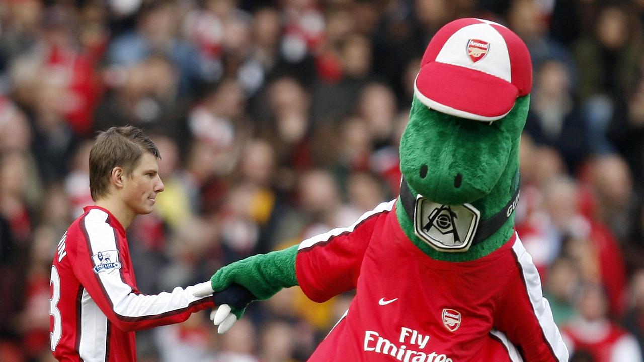 Arsenal fans were battling to save the long-serving Gunnersaurus after it was reported the man behind the mascot had been released as part of cost-cutting measures. (Photo by Adrian DENNIS / AFP)