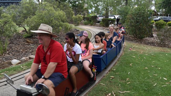 More smiles as they round the final corner of the train track at the Great Australian Bites Australia Day event 2023. Picture: Chloe Cufflin.