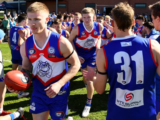 North Heidelberg run out onto the field during the 2023 Northern Football Netball League Melbourne Greyhounds Division 1 Seniors Elimination Final match between North Heidelberg and Hurstbridge at Preston City Oval in Preston, Victoria on September 3, 2023. (Photo by Josh Chadwick)