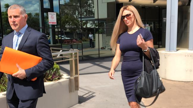 Tegan Louise Curtis leaves Southport Courthouse with her lawyer Mark Bamberry, of Bamberry Lawyers (left).