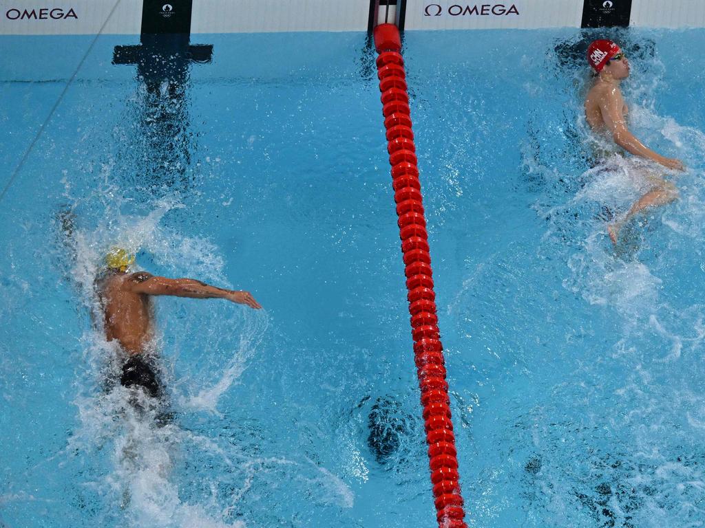 Pan Zhanle hits the wall ahead of Chalmers. Picture: Jonathan Nackstrand / AFP