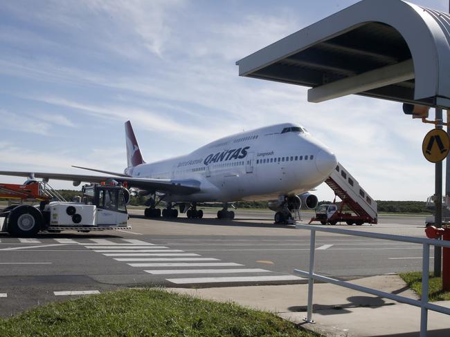 A Qantas plane yesterday made an emergency landing at Cairns airport en route from Tokyo to Sydney Picture: Anna Rogers