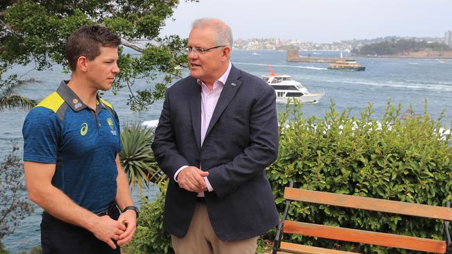 Prime Minister Scott Morrison, seen here with Australian captain Tim Paine, will be a key figure in trying to get the Test series against India to go ahead. Picture: Mark Evans/Getty Images